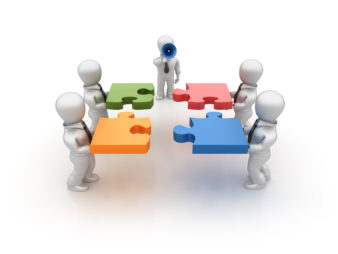 A graphic of four people working together to bring large pieces of a jigsaw together, being conducted by one person with a megaphone